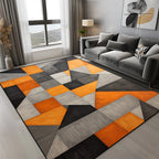 Tapis Géométrique Motif Triangles Orange Gris Noir